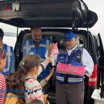 humanity First disaster relief distributing candies to kids